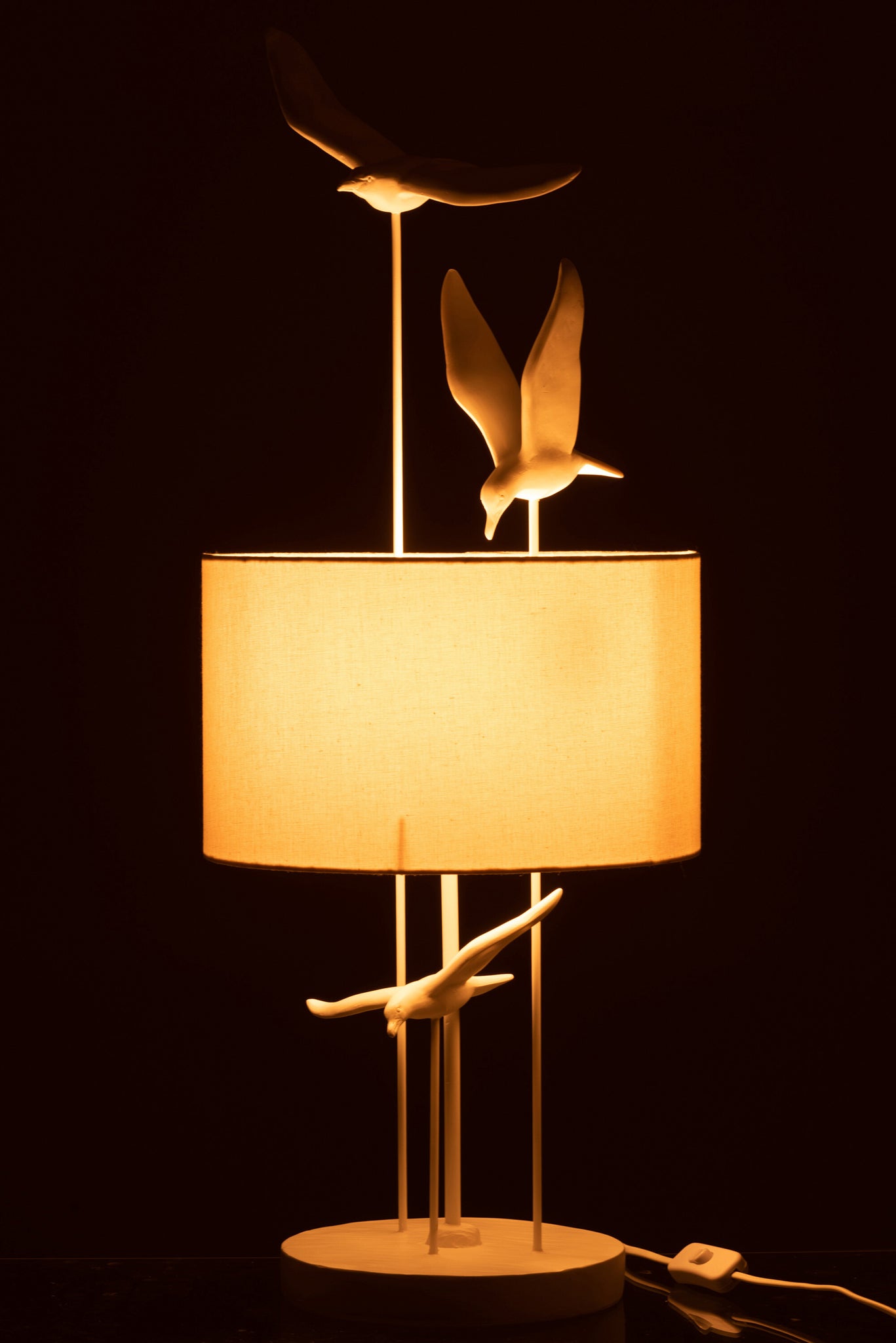 moderne tischlampe mit vogelskulptur