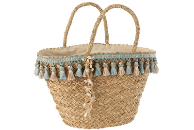 Geflochtene Strandtasche aus Seagrass mit blauen Quasten