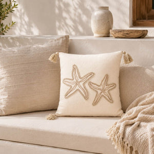 Coussin décoratif étoile de mer beige à pompons